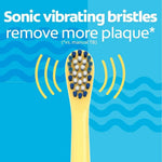 Yellow electric toothbrush head with sonic vibrating bristles for plaque removal.
