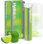 Hydralyte Lemon Lime effervescent electrolyte tablets tube and box with fresh lime slices.