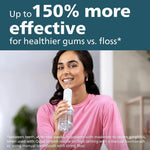 Woman using a water flosser for effective gum health and oral hygiene compared to string floss.
