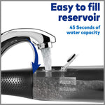 Filling the water reservoir of an oral hygiene device using a chrome faucet.