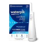 Waterpik Cordless Pulse 3100 water flosser with two tips and charging cable.
