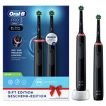 Oral-B Pro 3 Black Edition electric toothbrush gift set with bonus handle and charging base.