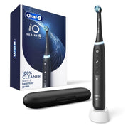 Oral-B iO Series 5 electric toothbrush with charging case and white stand.