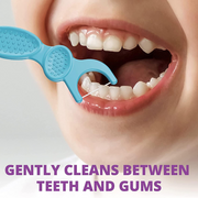 A blue dental floss pick cleaning between teeth and gums for oral hygiene.
