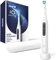Oral-B iO Series 5 electric toothbrush with charging base and travel case.