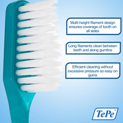 TePe toothbrush with multi-height filaments for cleaning between teeth and gumline.