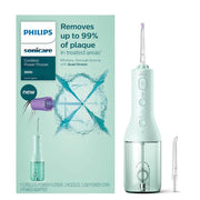 Philips Sonicare 3000 Cordless Power Flosser oral irrigator with two nozzles and USB charging.
