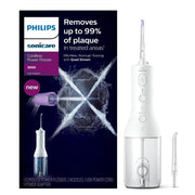 Philips Sonicare Cordless Power Flosser 3000 oral irrigator with two nozzles and USB charger.