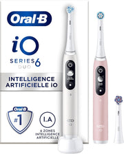Oral-B iO Series 6 Duo electric toothbrush set with two handles and replacement brush heads.