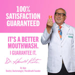 Dr. Harold Katz holding a small oral care product against a pink background.