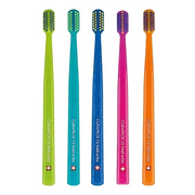 Five colorful Curaprox CS 5460 ortho toothbrushes in lime, teal, blue, pink, and orange.