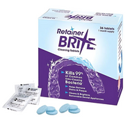 Retainer Brite cleaning tablets box with loose blue dental cleaning tablets.