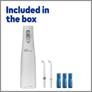 Waterpik water flosser kit with replacement tips and AA batteries included in the box.
