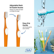 Orange toothbrush with an adjustable neck and easy-grip handle for oral hygiene.