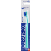 Curaprox Smart ultra soft toothbrush in light blue packaging for oral hygiene.