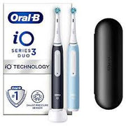 Oral-B iO Series 3 Duo electric toothbrushes with charging base and travel case.