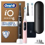 Oral-B iO Series 6 electric toothbrush set with black and pink handles and charging case.