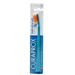 Curaprox 5460 ultra soft toothbrush with teal handle and orange bristles in packaging