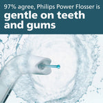 Philips Power Flosser emitting a gentle water stream for oral hygiene and gum care.